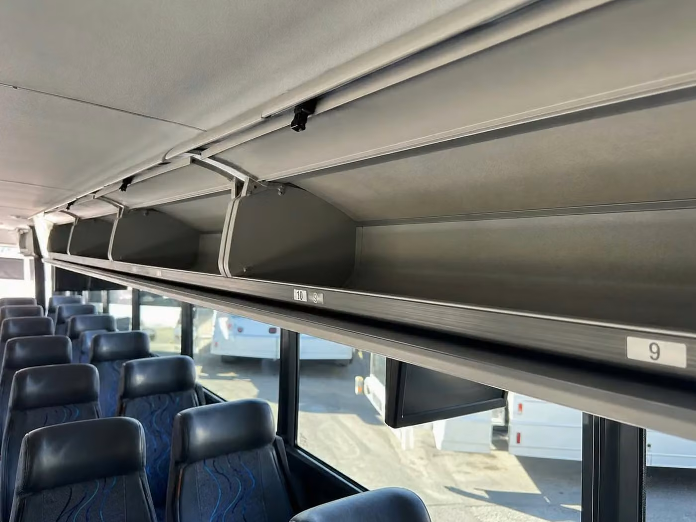 manhattan beach 25 passenger minibus overhead storage