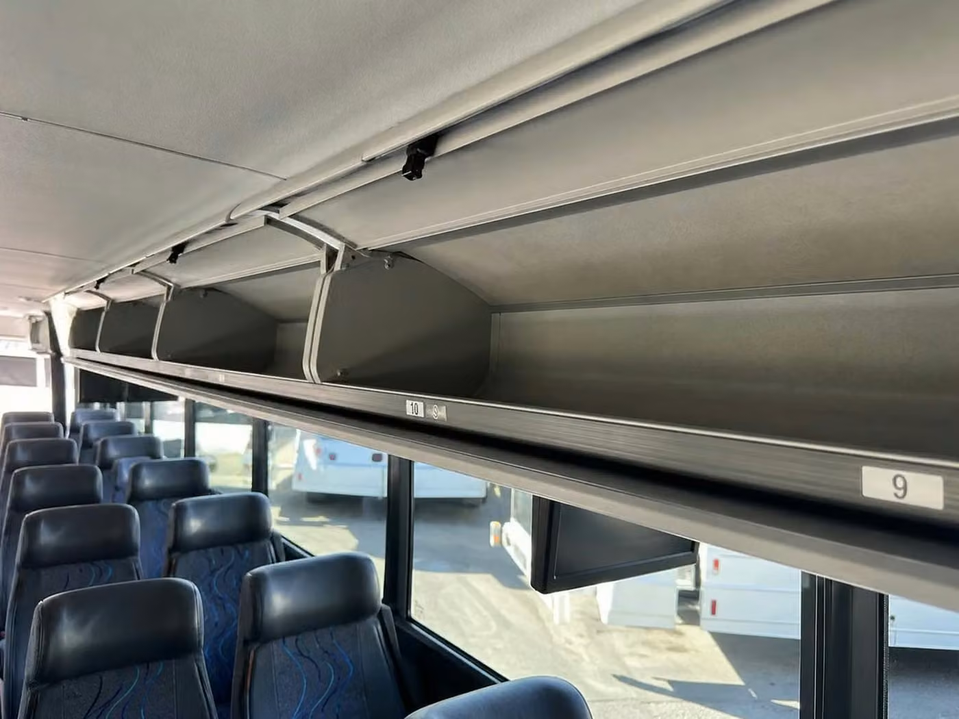 manhattan beach 56 passenger charter bus overhead storage