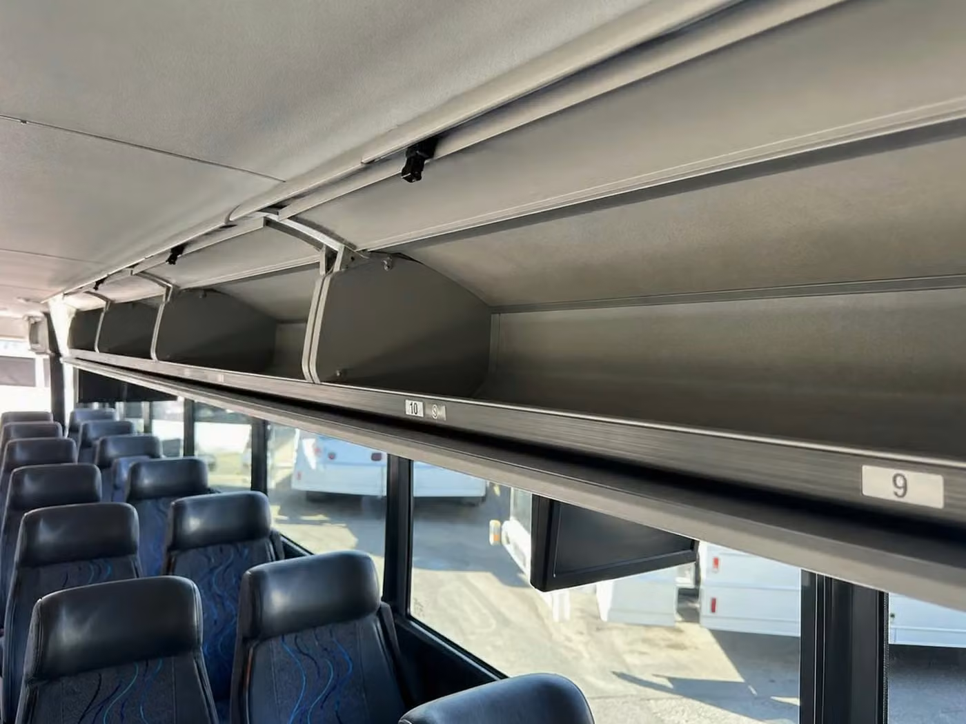 manhattan beach charter bus overhead storage